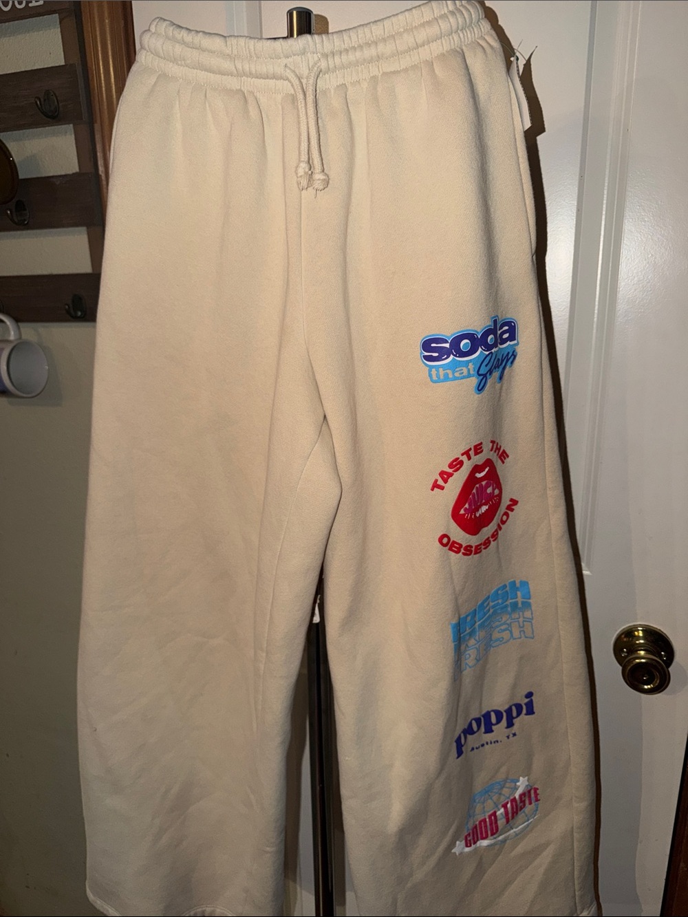 Cream Graphic Logo Sweatpants with Multicolor Prints